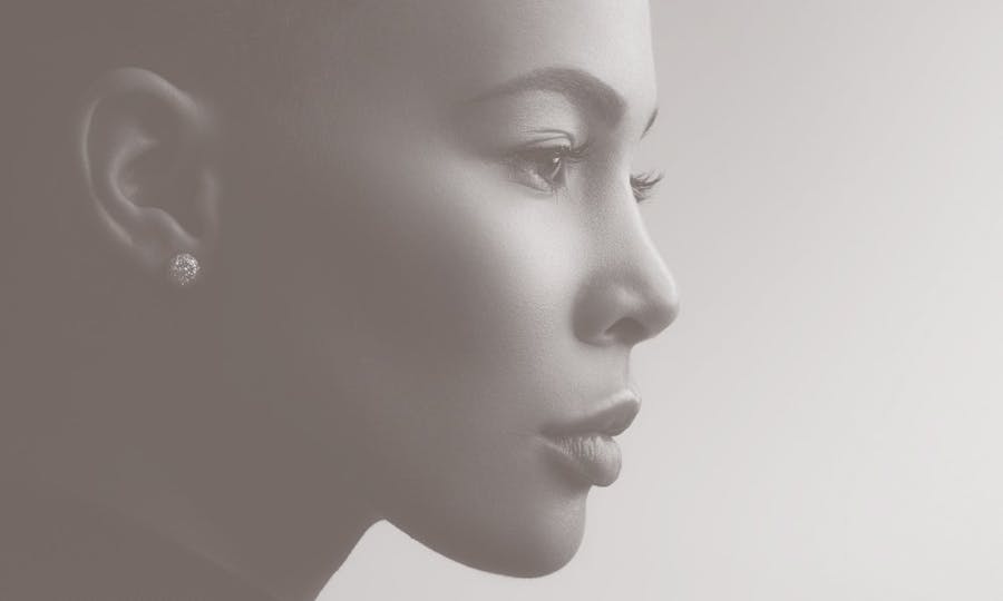 A woman in profile with very smooth skin