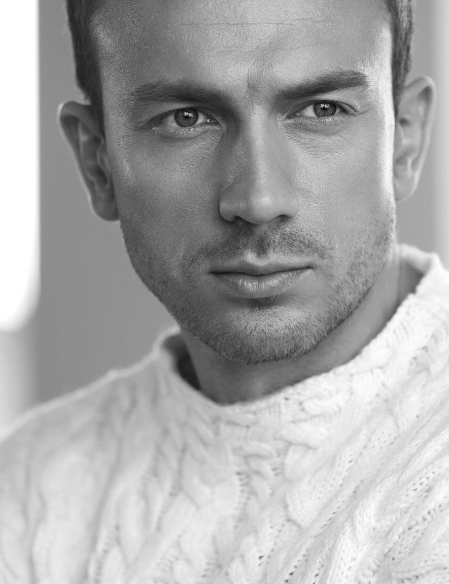 A handsome man with slight stubble highlighting Radiesse in Nashville.