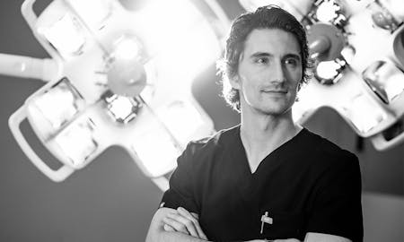 Dr. Bryant, plastic surgeon in an operating room