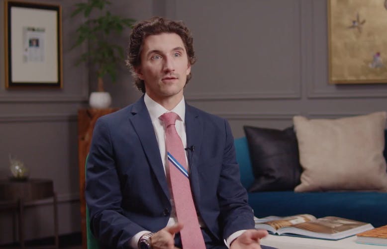 Dr. Bryant, facial plastic surgeon in Nashville, sitting in office
