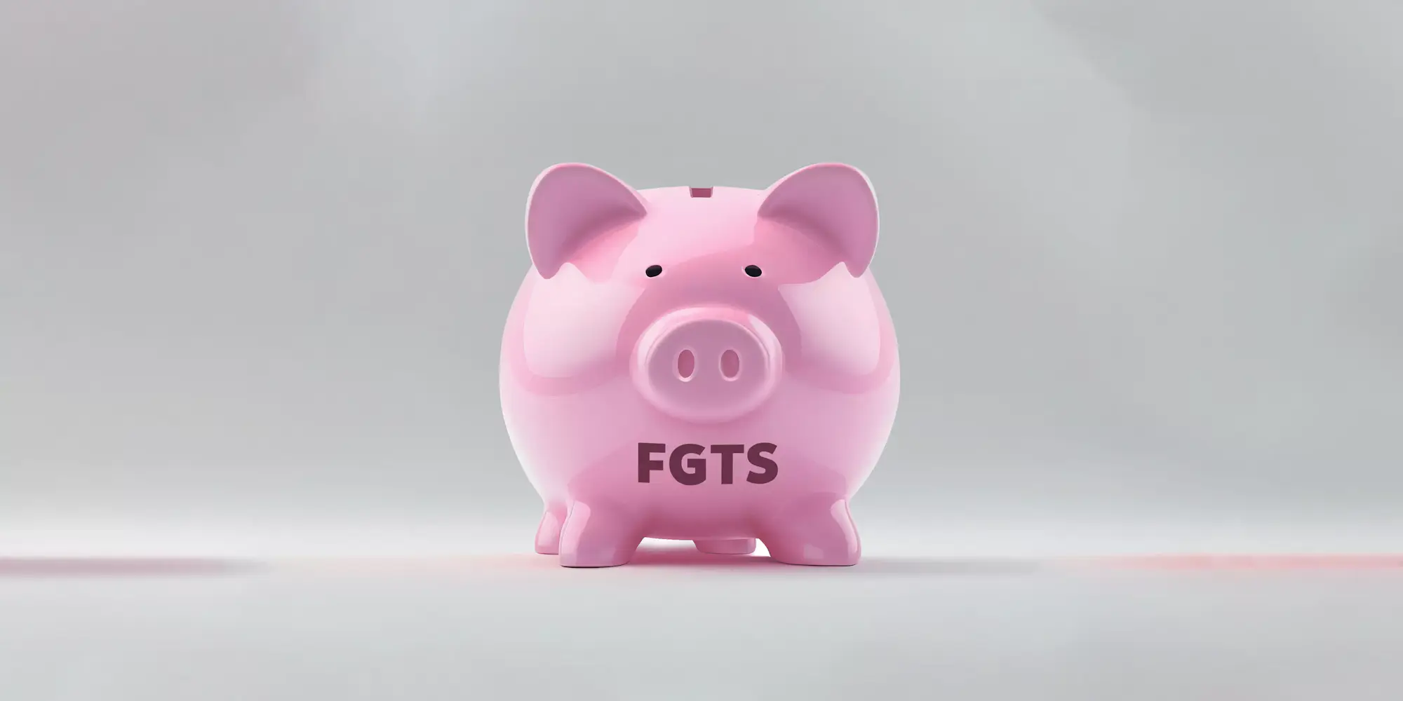 Porquinho rosa com escrita 'FGTS'
