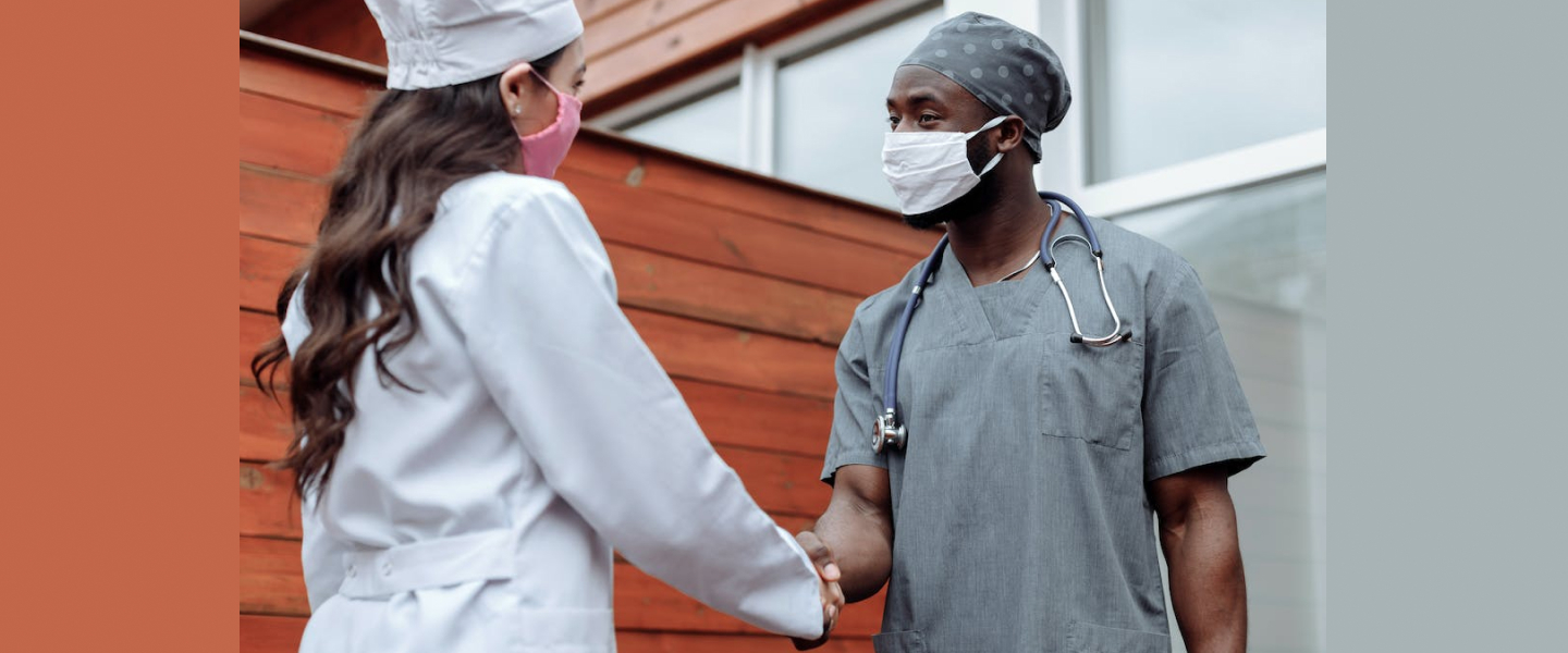 Two doctors, shaking hands