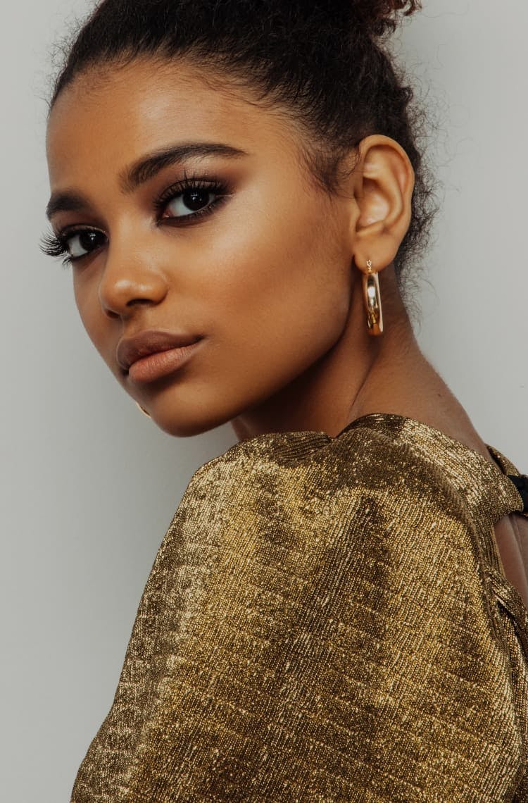 Beautiful woman turning head to the left
