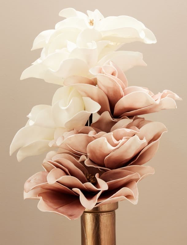 White & pink flowers in a copper vase.