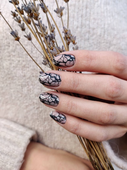 Two-tone abstract design on transparent nails