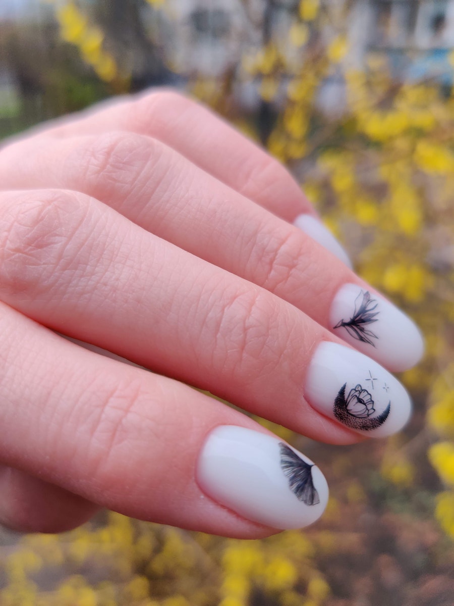 White glossy nails with engraving design