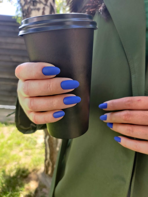 Deep blue matte manicure on long oval nails