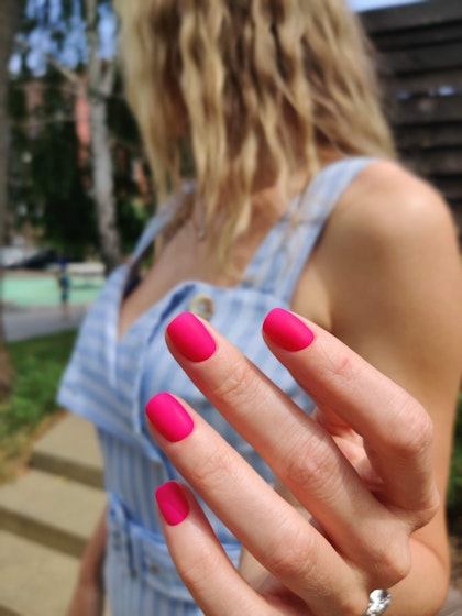 Hot pink matte manicure on short nails