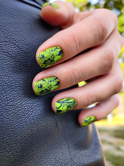 Bright light green manicure snakeskin