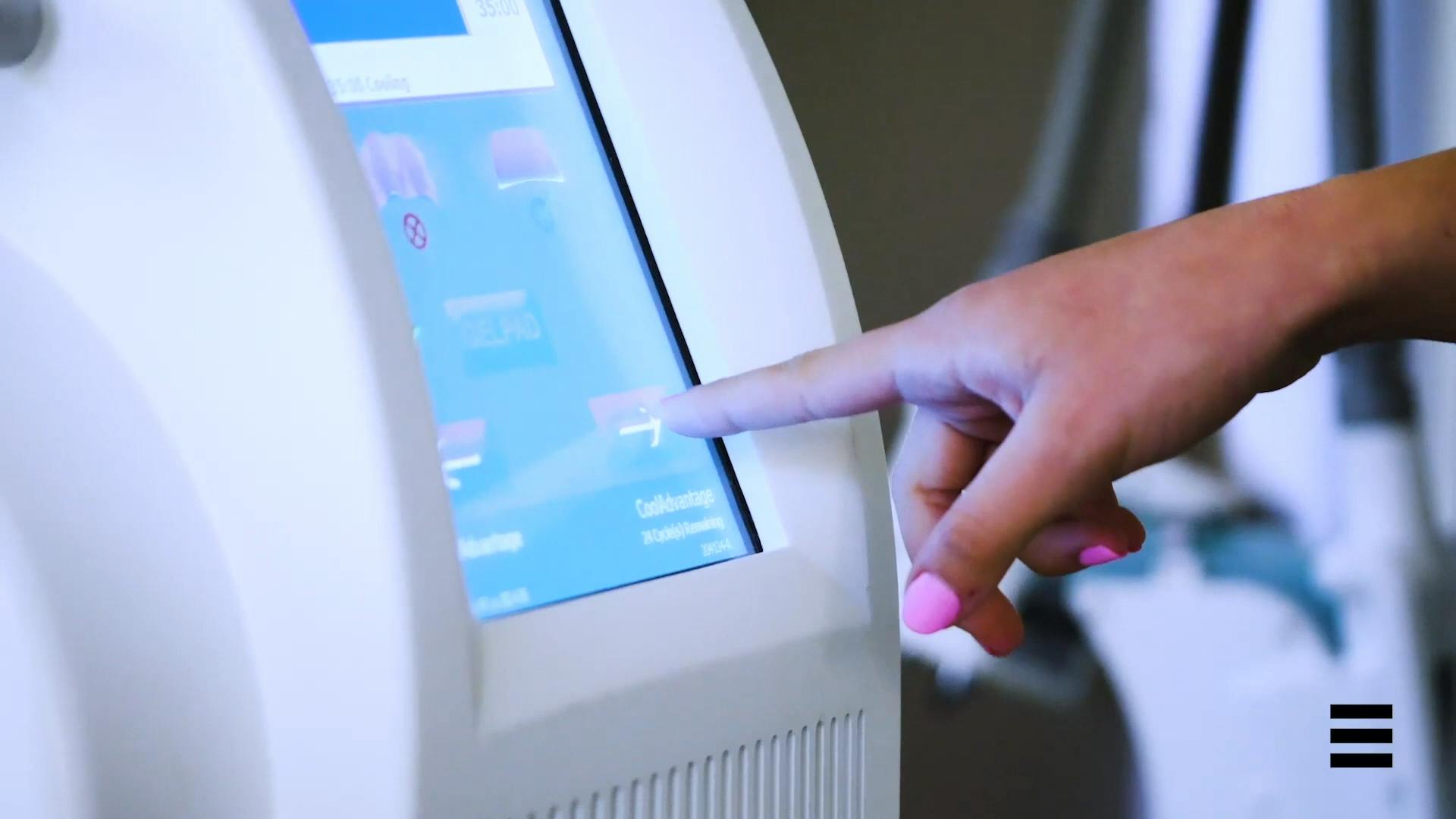 an image of someone using a coolsculpting machine