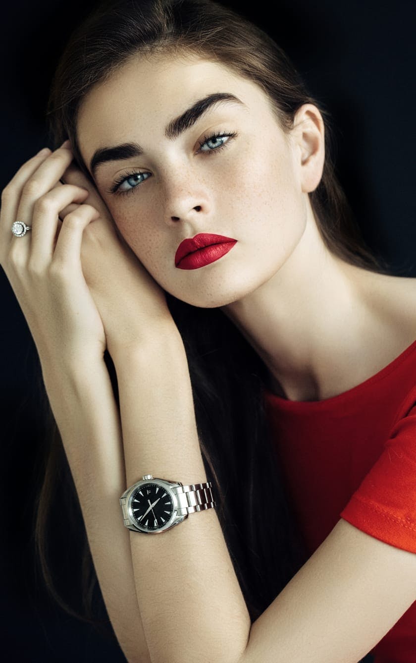 woman resting head on hands