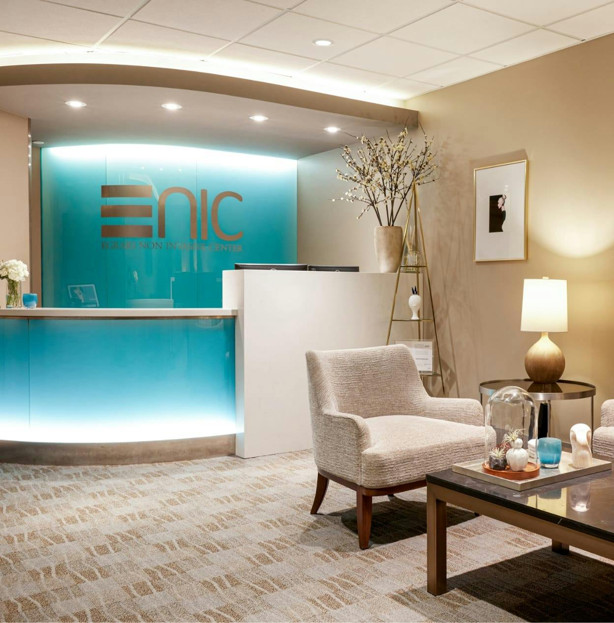 Our Seattle Enix office with chairs, coffee table and receptionist desk