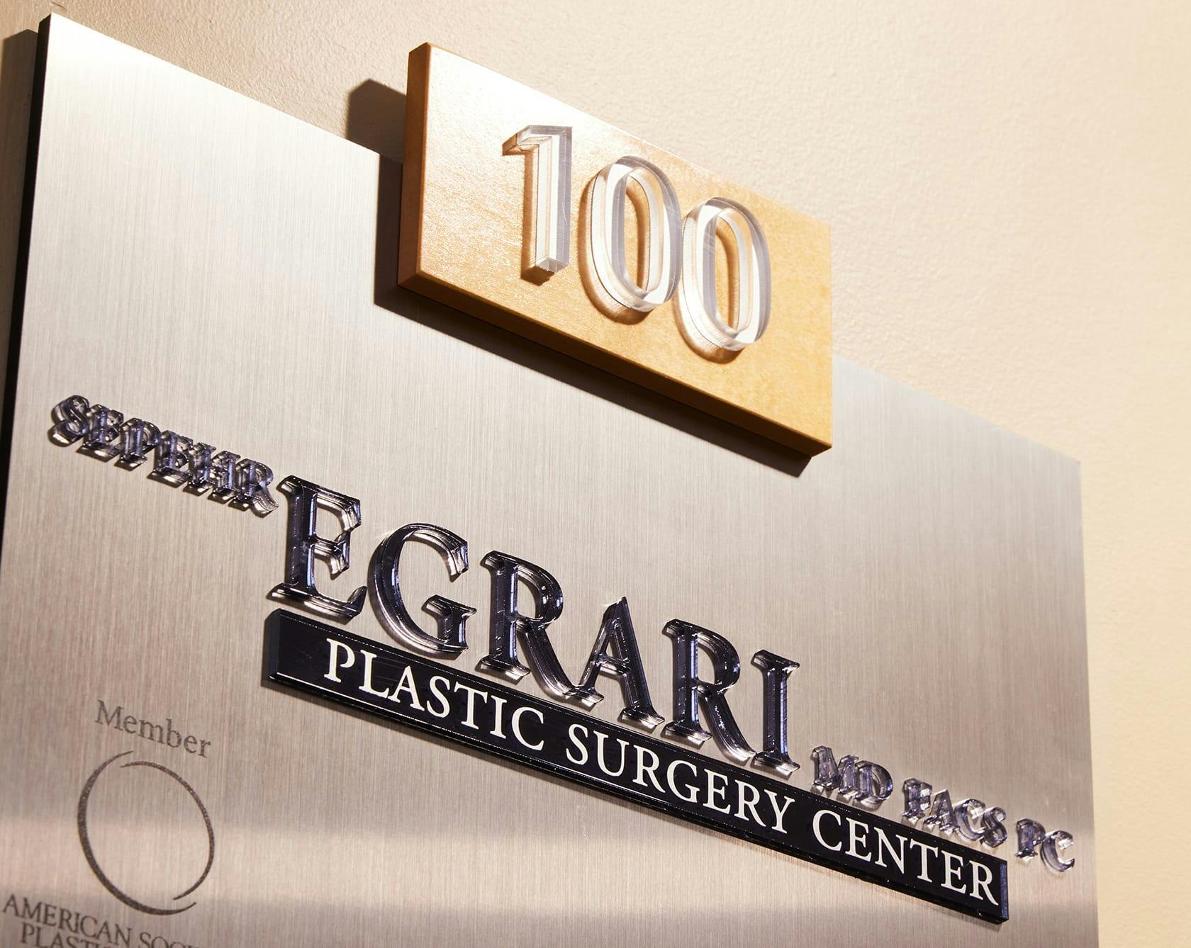 an image of the Egrari Plastic Surgery Center plaque
