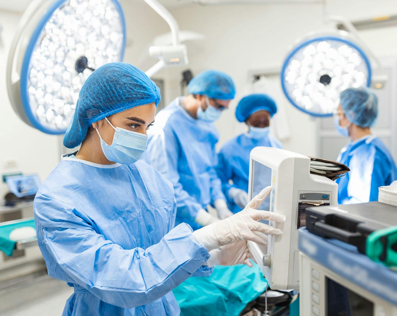 an image of a group of people in an operating room