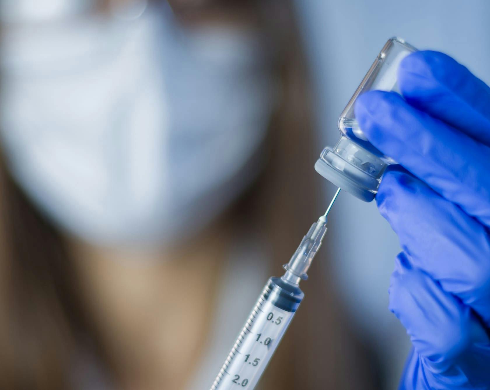 and image of a needle and syringe