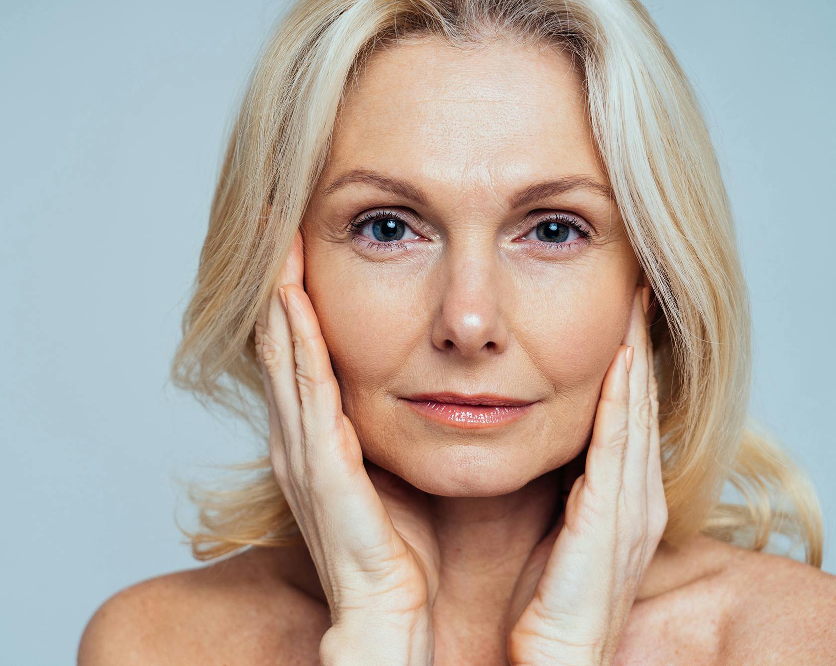 an image of an older woman without any makeup with blonde hair