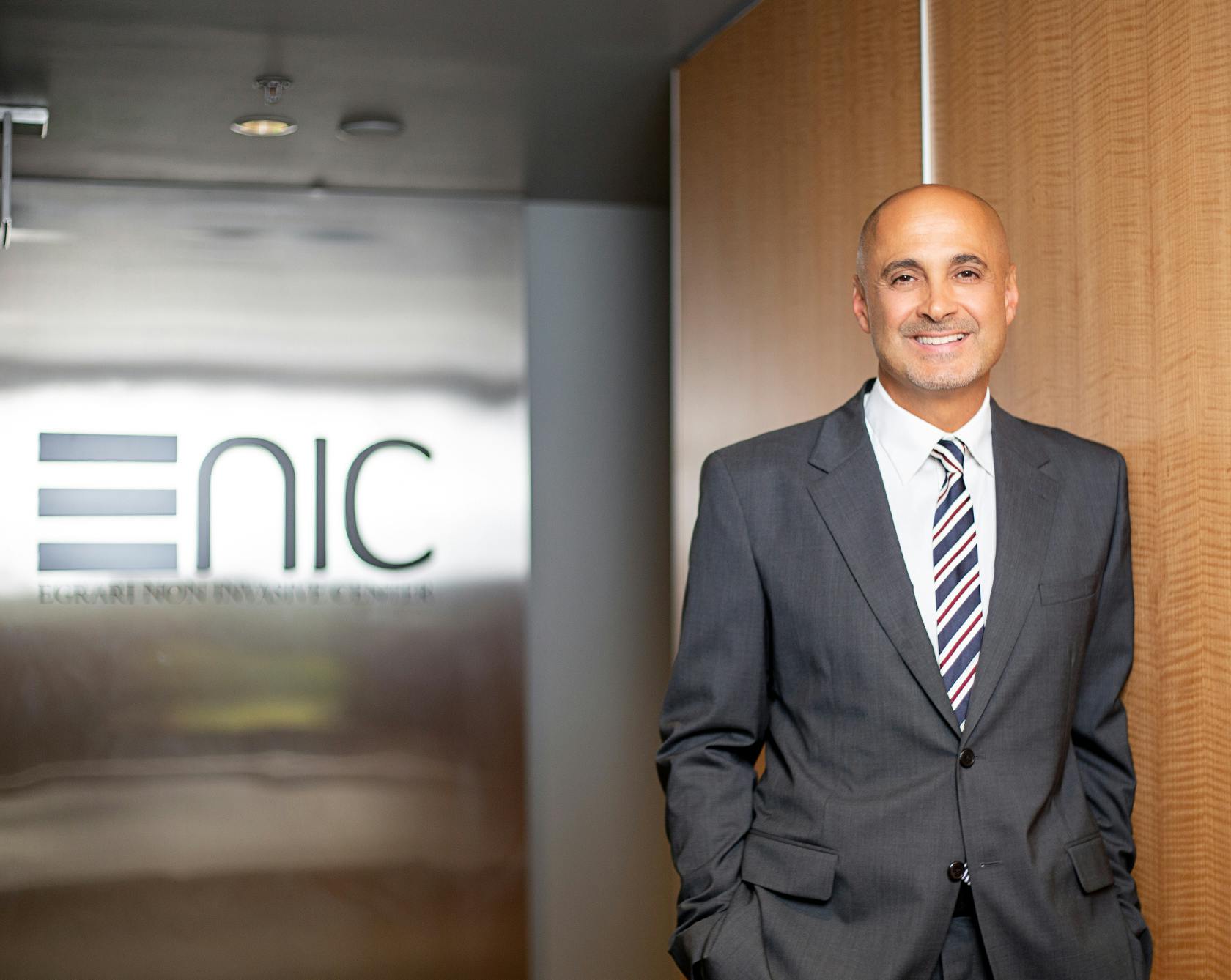an image of Dr. Egrari in the door way of Egrari Non Invasive Center