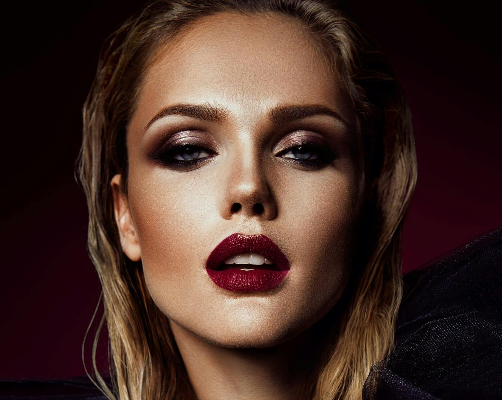 an image of a blonde woman in a lot of makeup