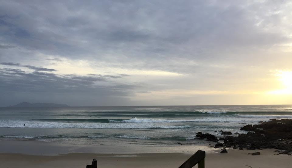 surfing in auckland te arai beach