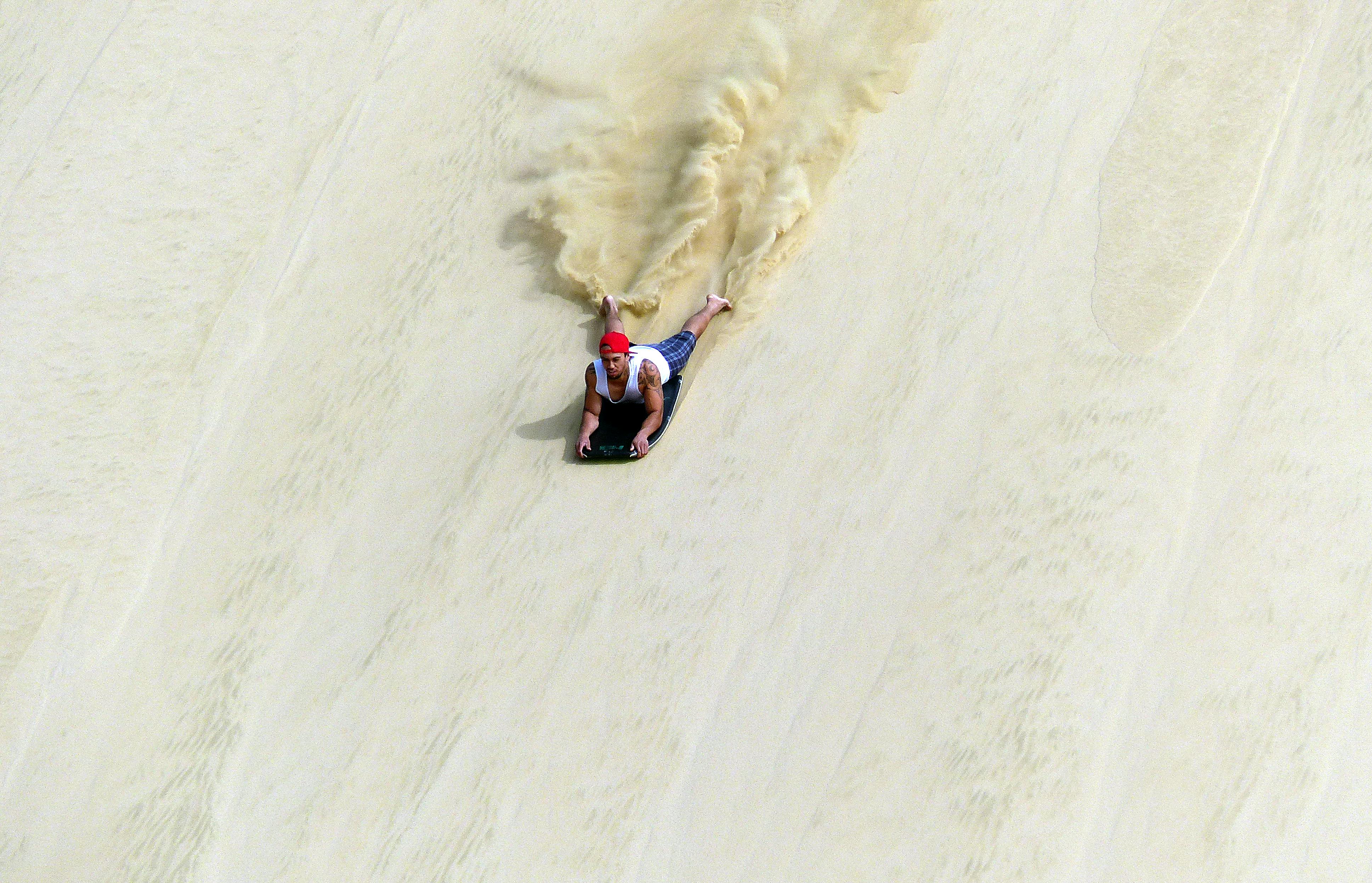 sand boarding cape reinga