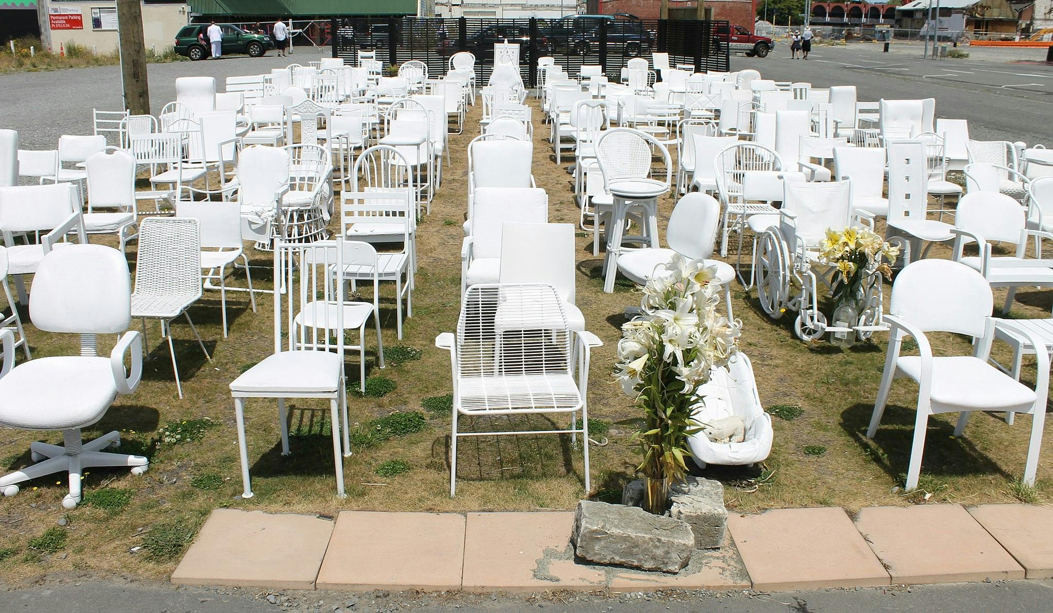 185 empty white chairs