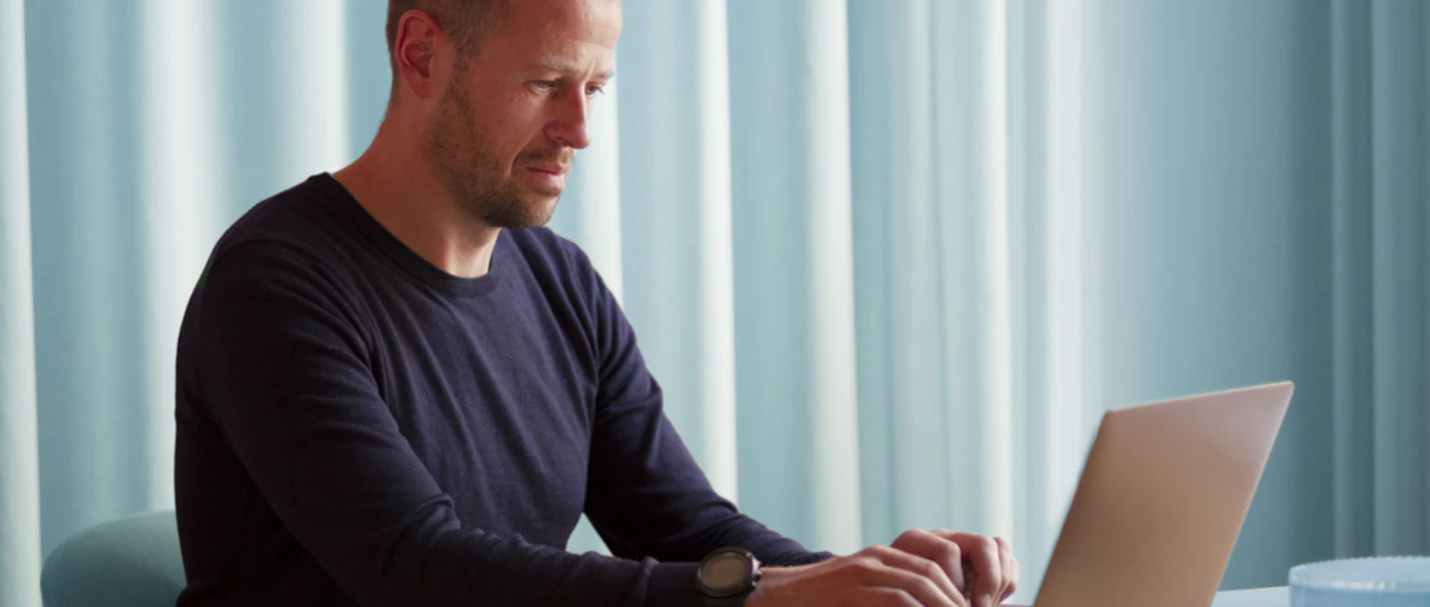 Treyd CEO Peter Beckman working on computer