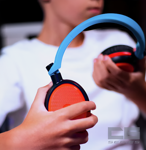 Person holding red and blue headset
