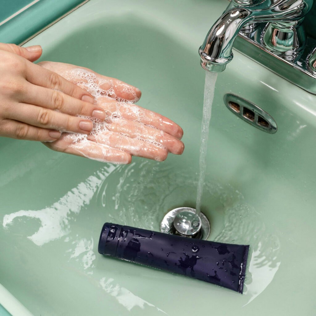 Washing hands in sink