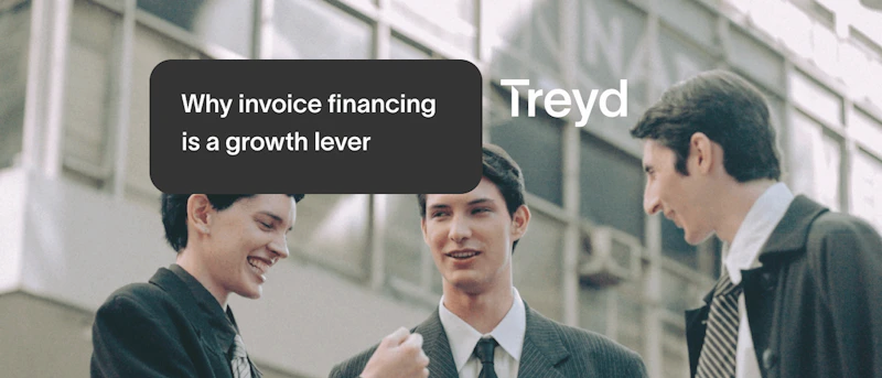 three people in front of office building joking around