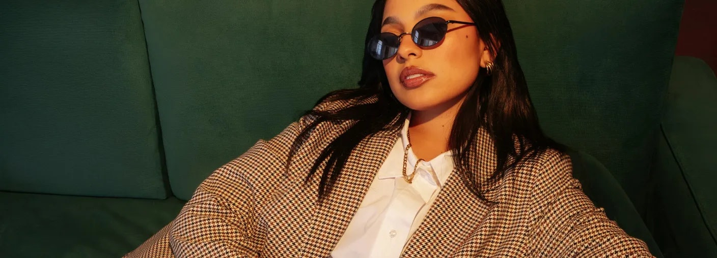 Woman with shades in confident position – inventory financing explained