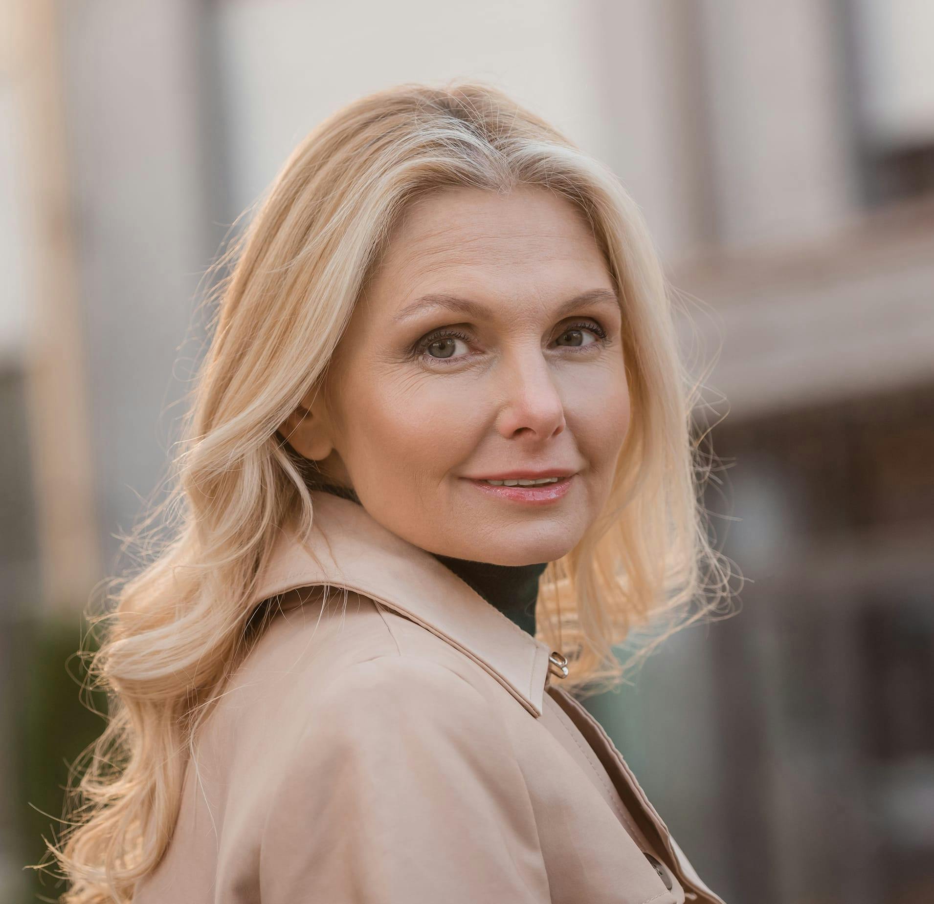 Blonde Woman with Beige Coat