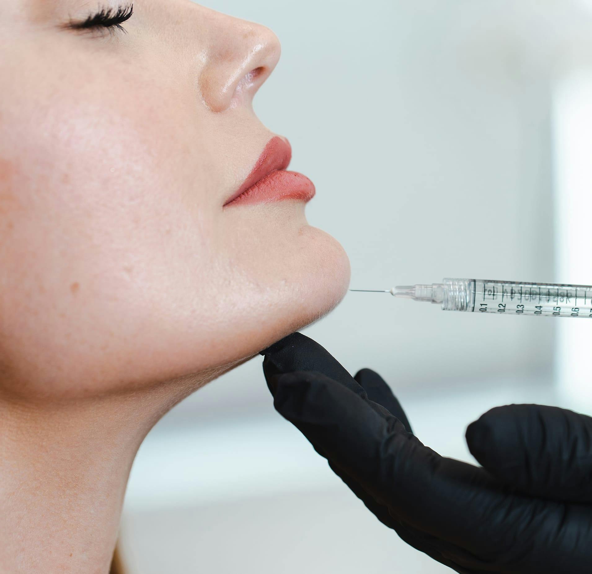 Woman Receiving Injection in her Chin