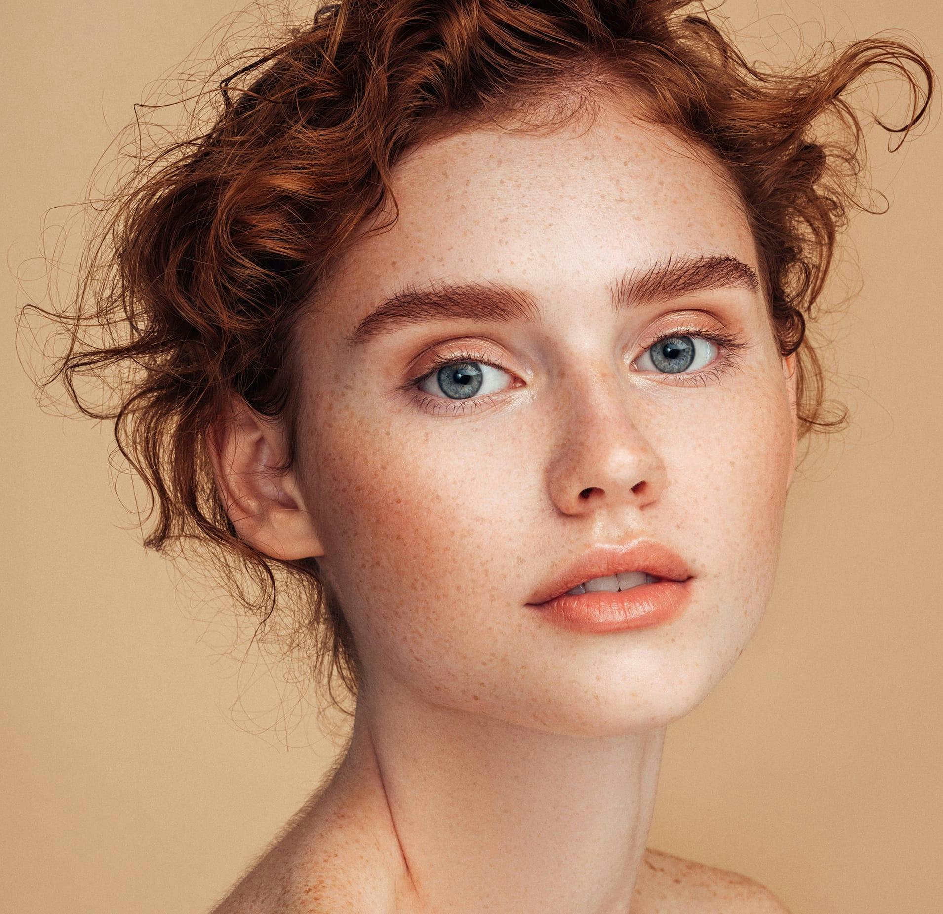 Woman with curly red hair