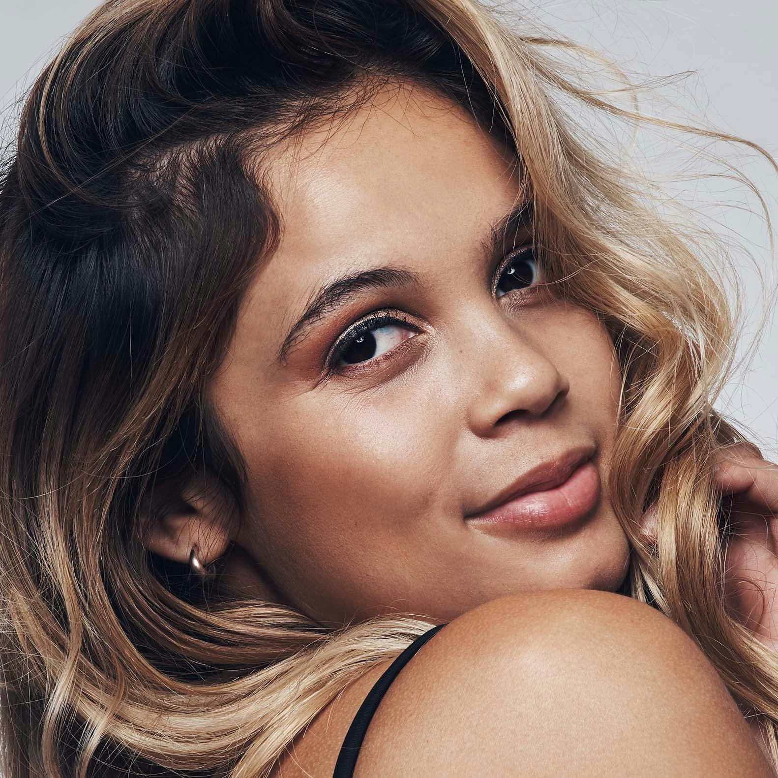 Woman Looking Over her Shoulder