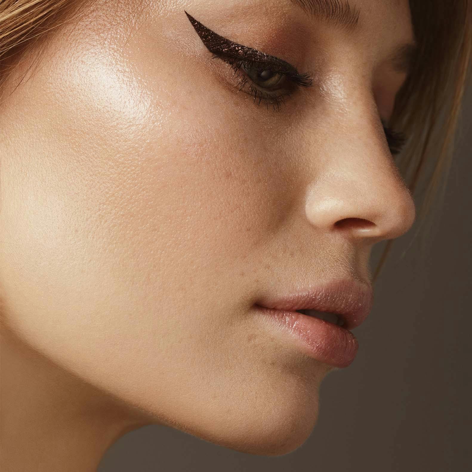 Close Up of Woman's Side Profile with Winged Eyeliner