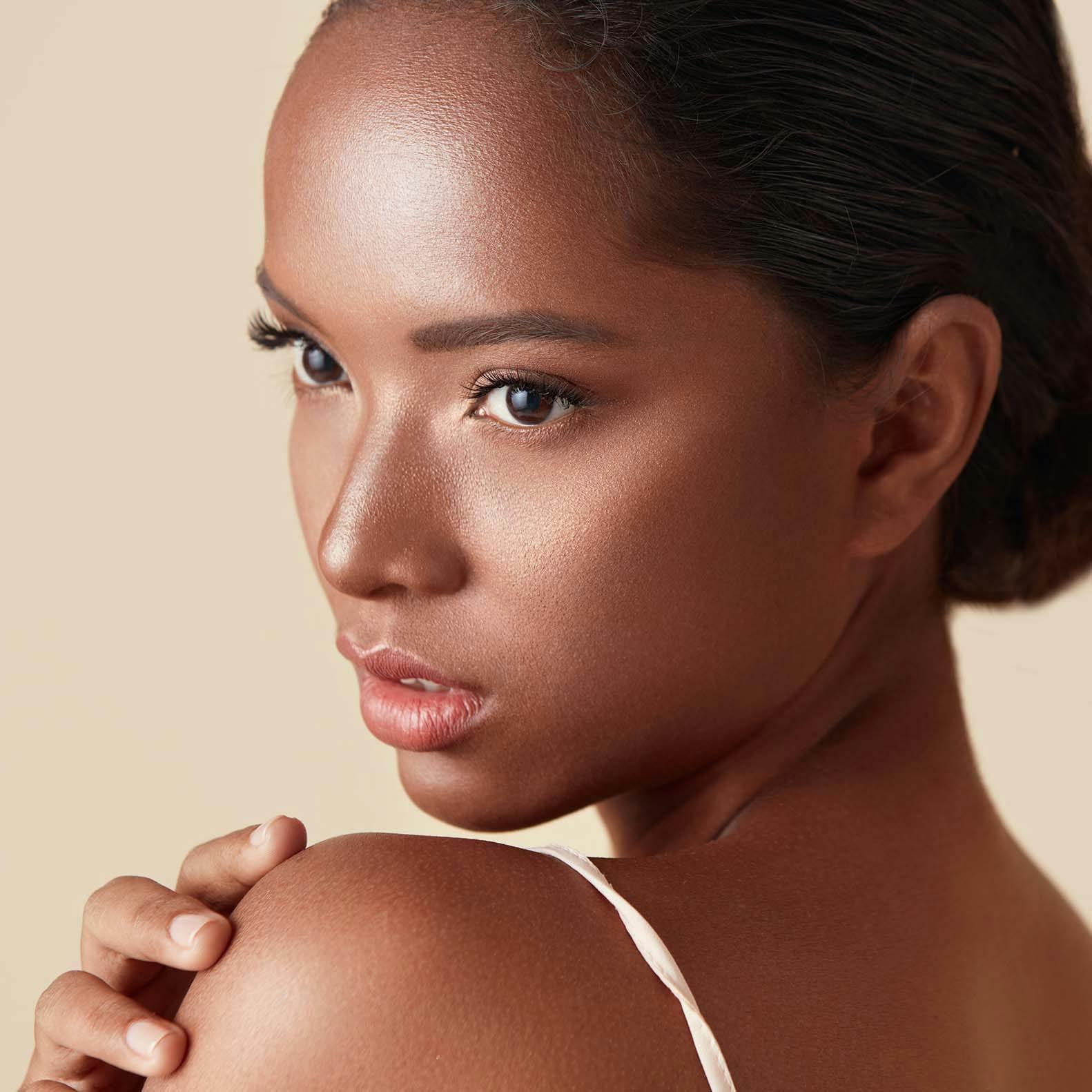 Beautiful Woman Looking Over her Shoulder