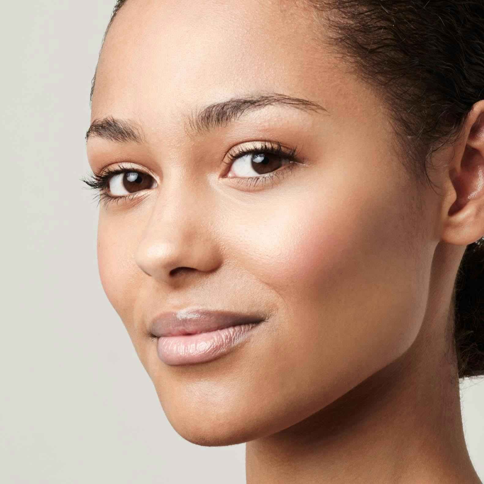 Beautiful light skinned woman smirking