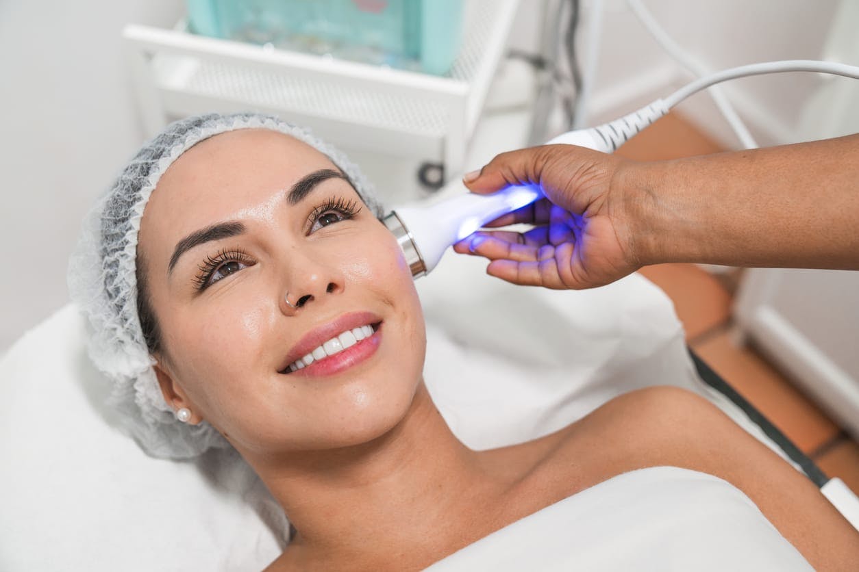 woman getting laser treatment