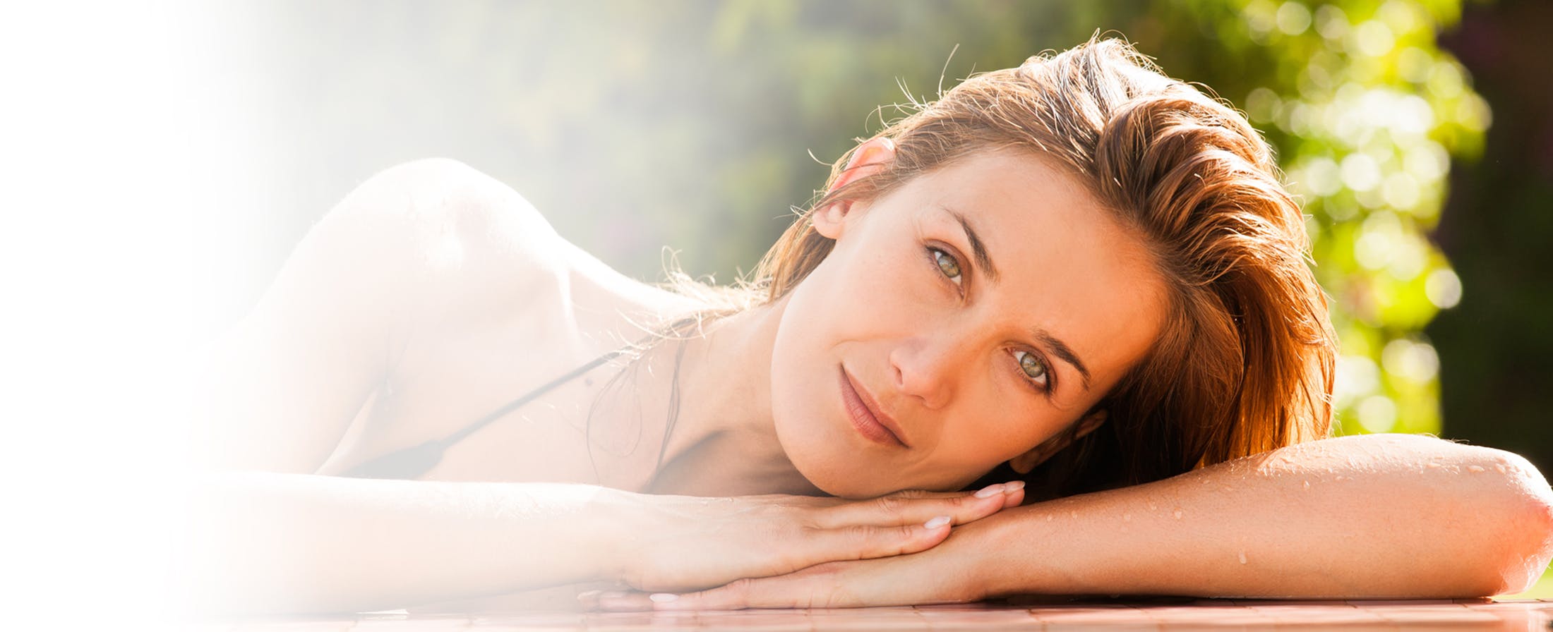 Woman resting her face on her hands