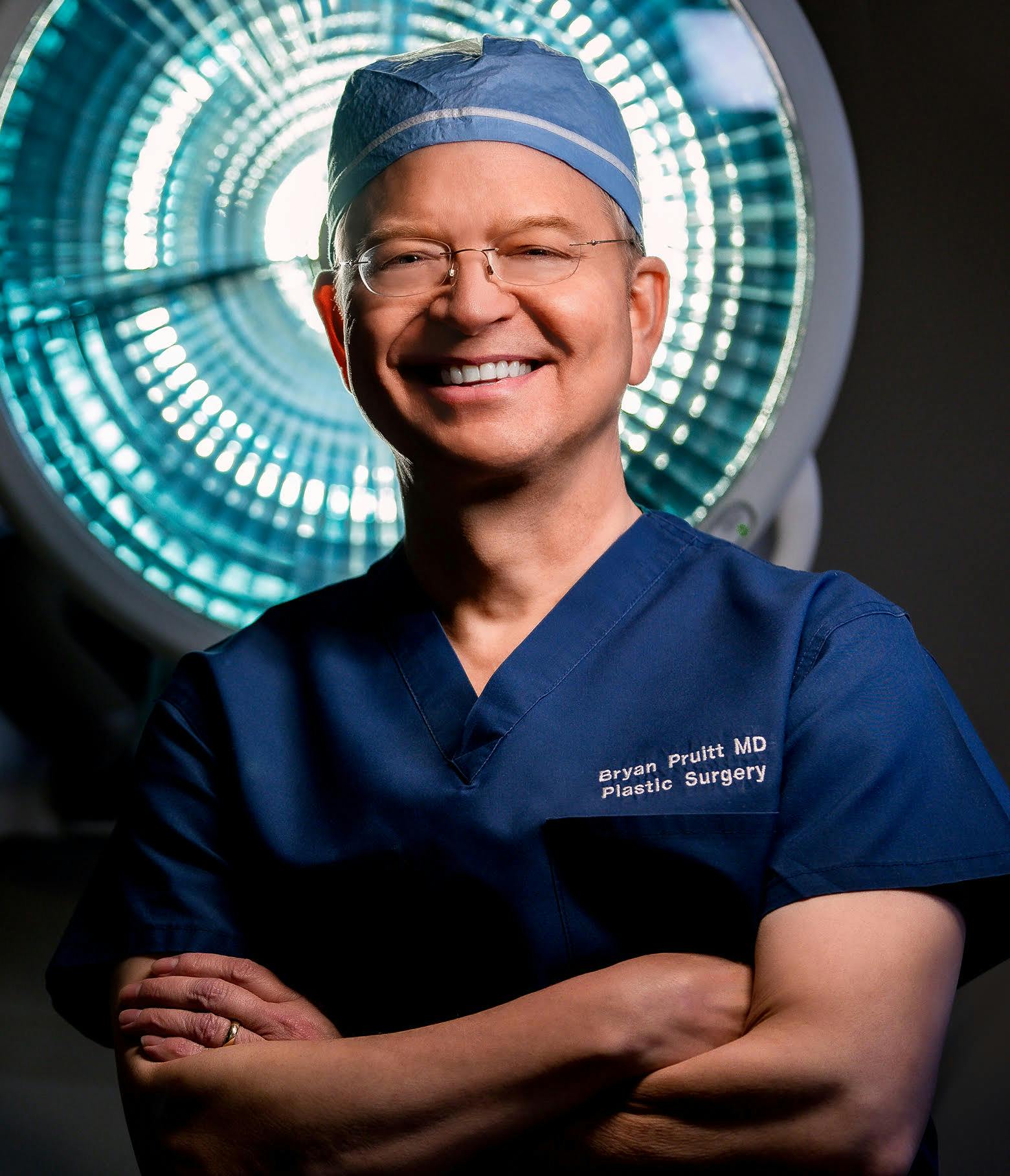 Dr. Pruitt with Surgical Light in the Background