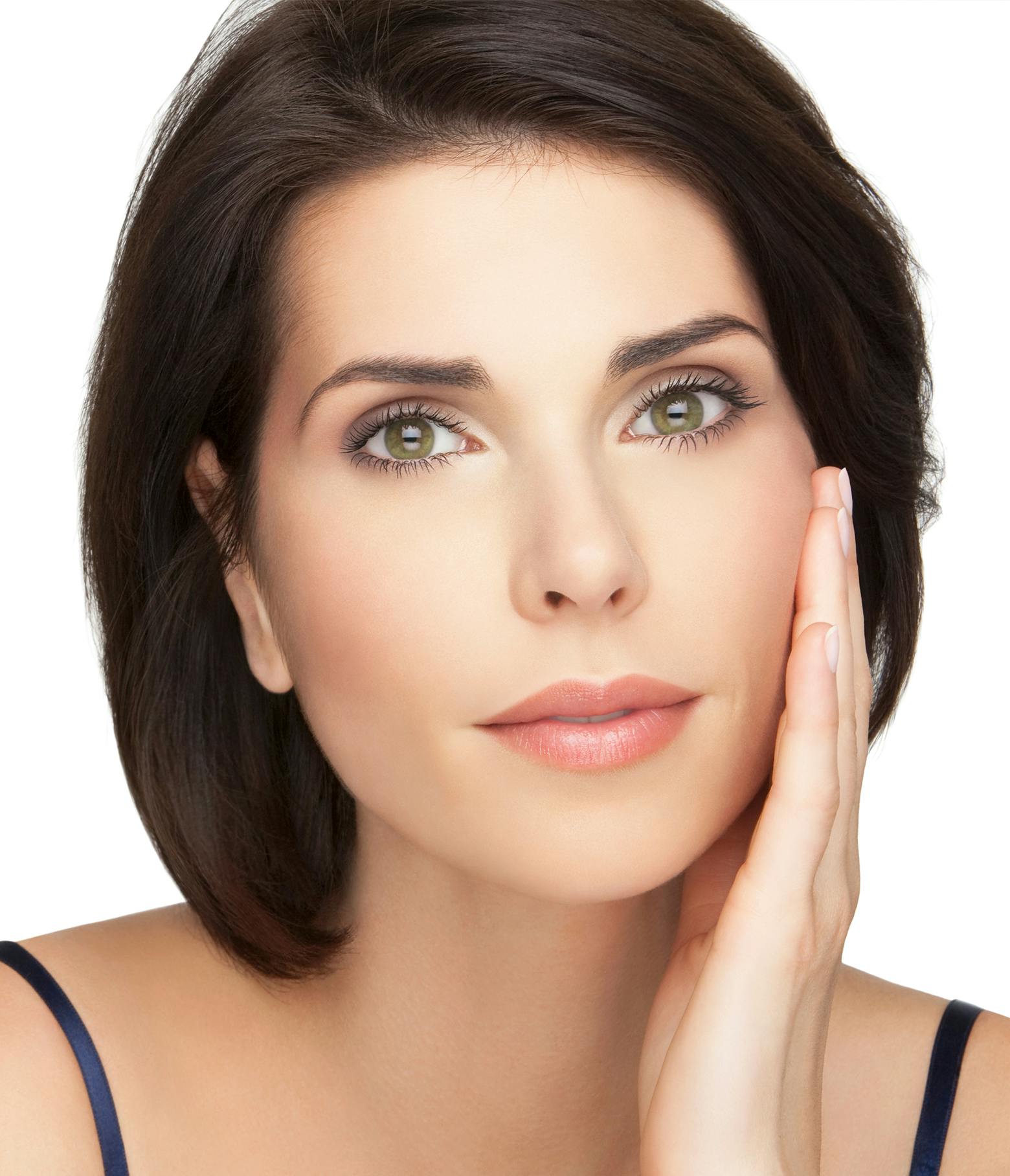 Woman with shoulder length black hair touching her face