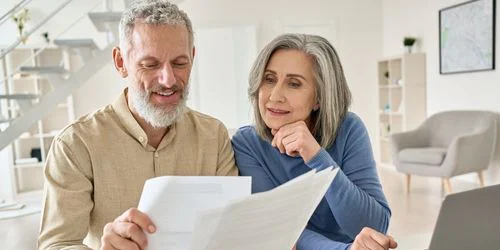 Elderly couple looking at options