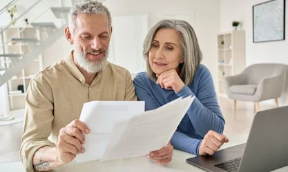 Elderly couple looking at options