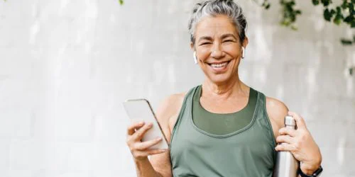 Smiling older woman prepared for a workout