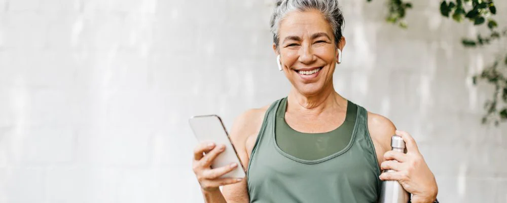 Smiling older woman prepared for a workout