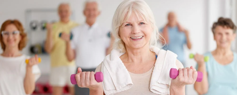 Woman with SilverSneakers Medicare plan in fitness class