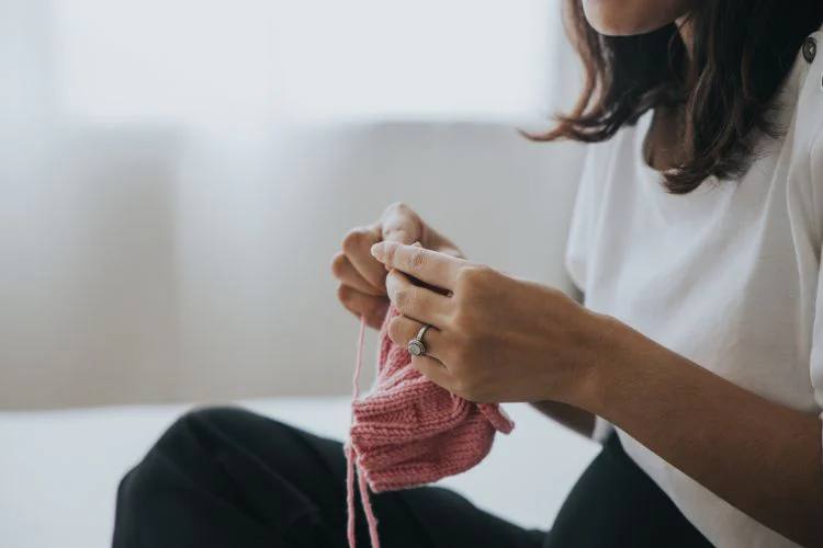 Woman knitting personalized gift