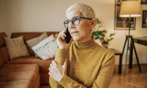older woman accepting call