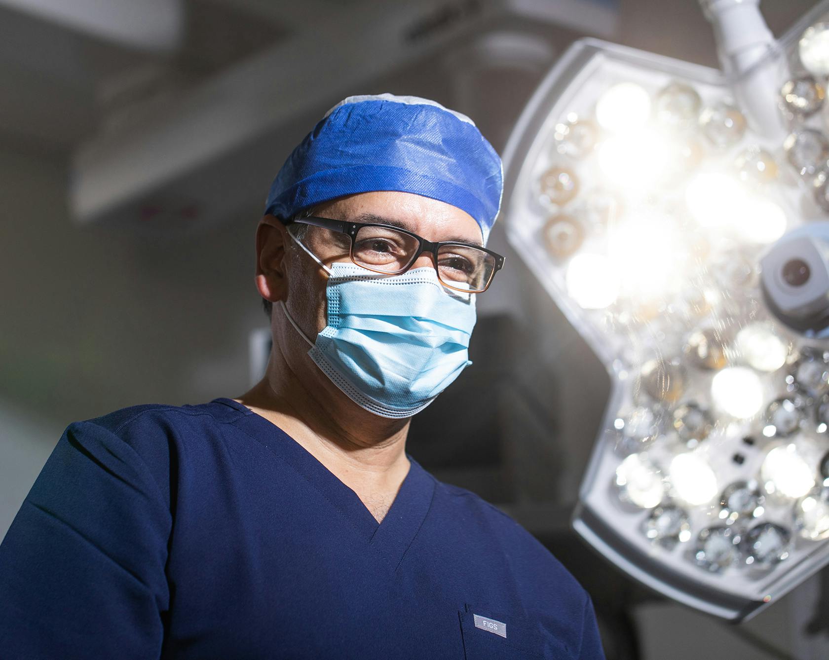 doctor performing surgery
