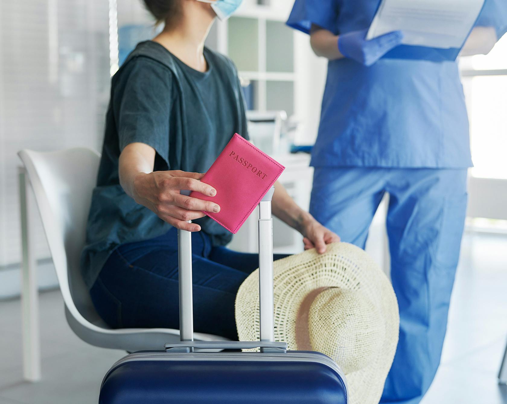 person holding a passport